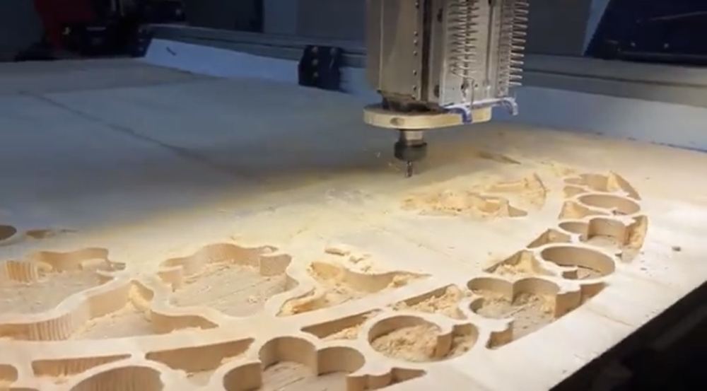 CNC router bit cutting wood in our Vancouver shop
