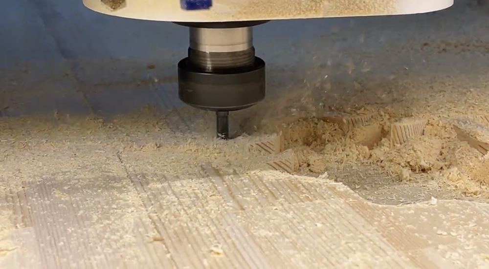 CNC router cutting custom shapes from a plywood sheet