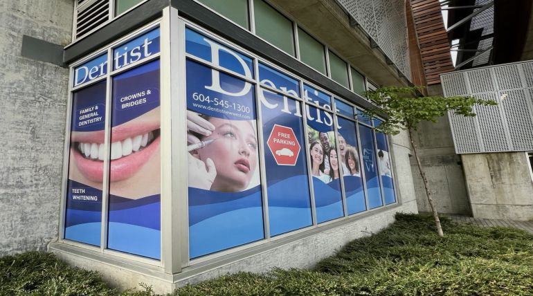 Perforated Window Graphics Installation for Storefront Branding